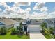 A charming single-Gathering home with lush landscaping and a two-car garage in a suburban neighborhood at 8706 Arrow Creek Dr, Parrish, FL 34219