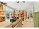 Open concept living space with kitchen access at 8717 Misty Creek Dr, Sarasota, FL 34241