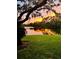 Enjoy stunning sunsets on this gorgeous lakeside property at 8717 Misty Creek Dr, Sarasota, FL 34241