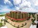 Aerial view of condo building by the beach at 8750 Midnight Pass Rd # 501, Sarasota, FL 34242