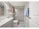 Updated bathroom with glass shower, vanity, and stylish fixtures for a modern look at 8750 Midnight Pass Rd # 501, Sarasota, FL 34242