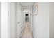 Hallway provides view of bedroom and leads to rest of home at 8750 Midnight Pass Rd # 501, Sarasota, FL 34242