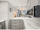 Modern kitchen with quartz countertops, stainless steel appliances, and subway tile backsplash at 8750 Midnight Pass Rd # 501, Sarasota, FL 34242