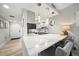 Eat-in kitchen with a long marble countertop, stainless appliances and updated fixtures at 8750 Midnight Pass Rd # 501, Sarasota, FL 34242