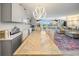 Open concept dining and living area with stylish decor and an inviting atmosphere at 8750 Midnight Pass Rd # 501, Sarasota, FL 34242