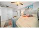 Cozy bedroom with beachy decor, creating a serene and relaxing atmosphere at 8750 Midnight Pass Rd # 501, Sarasota, FL 34242