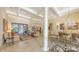Open living space featuring high ceilings and seamless indoor-outdoor flow at 8832 Enclave Ct, Sarasota, FL 34238