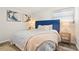 Cozy bedroom featuring a plush bed with stylish bedding, and modern bedside tables at 1008 37Th W St, Bradenton, FL 34205