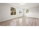 Spacious bedroom with three windows and light-colored flooring at 1008 37Th W St, Bradenton, FL 34205