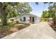 Charming single-story home featuring a manicured lawn, private driveway, and delightful curb appeal at 1008 37Th W St, Bradenton, FL 34205
