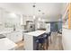 Bright, open kitchen with stainless steel appliances and island with seating at 1008 37Th W St, Bradenton, FL 34205