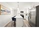 The updated kitchen features modern appliances and a spacious island at 1008 37Th W St, Bradenton, FL 34205