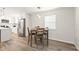 Eat-in kitchen features a table and stainless steel appliances at 1008 37Th W St, Bradenton, FL 34205