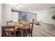 Open-concept living and dining area featuring contemporary decor and an inviting atmosphere at 1008 37Th W St, Bradenton, FL 34205