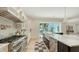 Contemporary kitchen featuring stainless appliances and a center island at 1076 Toc0Baga, Sarasota, FL 34234