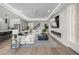 Stylish living room with recessed lighting, an electric fireplace, and hardwood floors at 11422 Apple Tree Cir, Bradenton, FL 34211