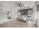 Spacious main bedroom features hardwood floors, tray ceilings, and ample natural light at 11422 Apple Tree Cir, Bradenton, FL 34211