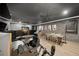 This gaming office features exposed brick walls, a modern desk, multiple monitors, and natural lighting at 11422 Apple Tree Cir, Bradenton, FL 34211