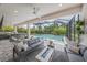 Inviting outdoor living space with a screened-in patio and a luxurious pool area at 11422 Apple Tree Cir, Bradenton, FL 34211