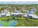 Waterfront townhome with serene lake views and access to community amenities, including tennis courts at 1240 Siesta Bayside Dr # 1240C, Sarasota, FL 34242