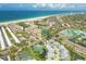 Beautiful coastal aerial view of the condo and nearby beach and amenities at 1240 Siesta Bayside Dr # 1240C, Sarasota, FL 34242