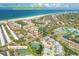Aerial view showing beach access 5 minutes away from this waterfront community with tennis courts at 1240 Siesta Bayside Dr # 1240C, Sarasota, FL 34242
