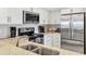 Well-equipped kitchen with stainless steel appliances and granite countertops at 1240 Siesta Bayside Dr # 1240C, Sarasota, FL 34242