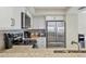 Well-equipped kitchen with stainless steel appliances and granite countertops at 1240 Siesta Bayside Dr # 1240C, Sarasota, FL 34242