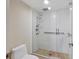 Modern bathroom with a glass-enclosed shower, featuring a rainfall showerhead and stylish tile work at 1240 Siesta Bayside Dr # 1240C, Sarasota, FL 34242