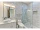 Bathroom with glass shower enclosure, rain shower head, and modern vessel sink and fixtures at 12814 Daisy Pl, Bradenton, FL 34212