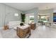Airy and inviting living space with comfortable seating, modern decor, and plenty of natural light at 12814 Daisy Pl, Bradenton, FL 34212