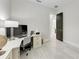 Bright office features modern desk, chair, and decor at 12814 Daisy Pl, Bradenton, FL 34212