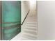 Light and bright stairway with neutral paint and modern decor at 12814 Daisy Pl, Bradenton, FL 34212