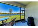 Screened lanai with a view of the lake at 12827 Lily Quartz Loop, Parrish, FL 34219