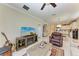 Bright living area that opens to the kitchen and dining area, offering a comfortable seating arrangement at 12827 Lily Quartz Loop, Parrish, FL 34219