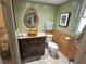Stylish bathroom featuring decorative sink basin, vanity with drawers, and tiled shower at 1308 63Rd Nw St, Bradenton, FL 34209