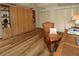Comfortable bedroom with a built-in Murphy bed, shelving, and closet at 1308 63Rd Nw St, Bradenton, FL 34209