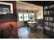 Charming dining room featuring hardwood floors, natural light, and a stylish table set at 1308 63Rd Nw St, Bradenton, FL 34209