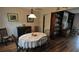 Comfortable dining area with hardwood floors, decorative accents, and a spacious layout at 1308 63Rd Nw St, Bradenton, FL 34209