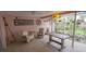 Charming screened patio with comfortable seating and decorative elements at 1308 63Rd Nw St, Bradenton, FL 34209