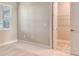Comfortable carpeted bedroom with a window offers a calm retreat and convenient access to a walk-in closet at 13908 Painted Loop, Parrish, FL 34219