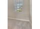 Cozy bedroom features plush carpeting, natural light, and fresh paint at 13908 Painted Loop, Parrish, FL 34219