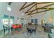 Spacious gathering room featuring elegant lighting, high ceilings, and comfortable seating at 13908 Painted Loop, Parrish, FL 34219