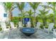 Cozy fire pit area with comfortable seating, perfect for social gatherings at 13908 Painted Loop, Parrish, FL 34219