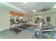 Well-equipped gym featuring treadmills and elliptical machines, perfect for maintaining an active lifestyle at 13908 Painted Loop, Parrish, FL 34219