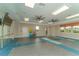 Bright studio featuring fitness equipment, mirrored walls, and ample natural light at 13908 Painted Loop, Parrish, FL 34219