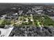 An aerial view shows the layout of a large residential property with mature trees and a house at 15780 Wilson Rd, Sarasota, FL 34240