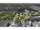 Aerial view of property showcasing the expansive acreage, mature trees, and multiple structures at 15780 Wilson Rd, Sarasota, FL 34240