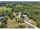 Secluded property featuring a home, large barn, and expansive grounds, perfect for rural living at 15780 Wilson Rd, Sarasota, FL 34240
