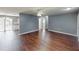 The open-concept space connects a living room with hardwood floors to the kitchen at 1707 24Th E St, Palmetto, FL 34221
